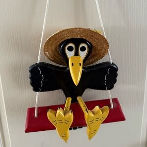 Whimsical Black and Yellow Bird Swing by [Brand]